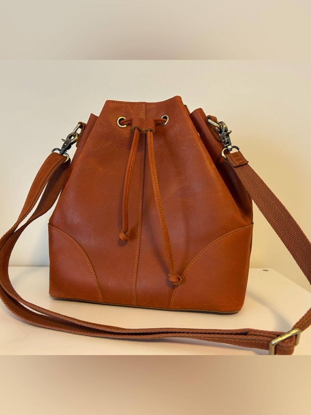 Genuine Leather Drawstring Crossbody Bucket Bag in Cognac Brown